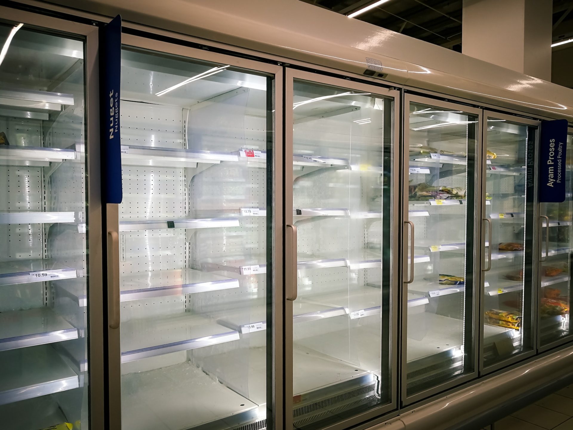 empty freezer in the supermarket during the lockdown of corona virus covid 19 pandemic